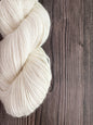 Baby Llama . undyed . Fingering . ecru and natural light grey