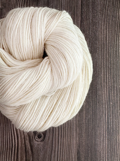 Baby Llama . undyed . Fingering . ecru and natural light grey