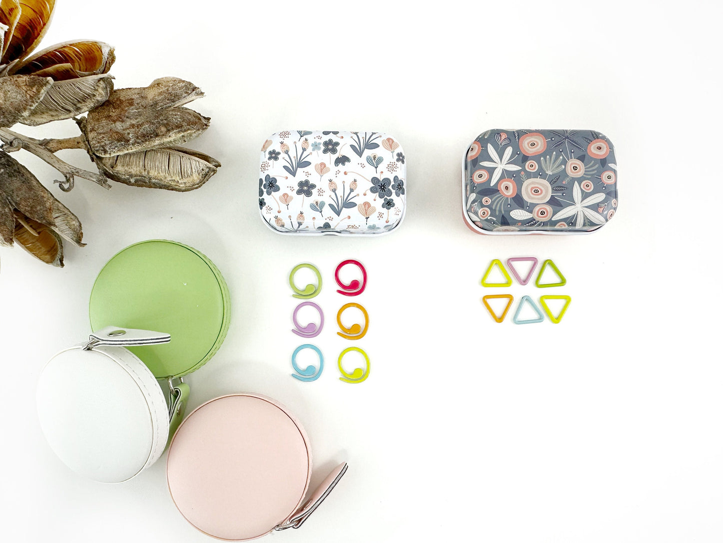 Knitting and crochet stitch markers . 30 assorted stitch markers in a collectible tin box