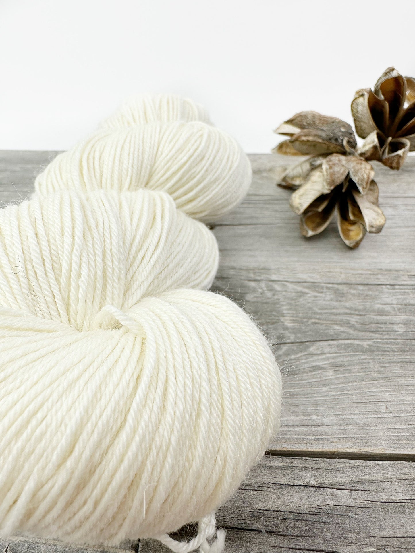 Baby Llama . undyed . Fingering . ecru and natural light grey