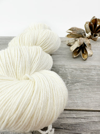 Baby Llama . undyed . Fingering . ecru and natural light grey