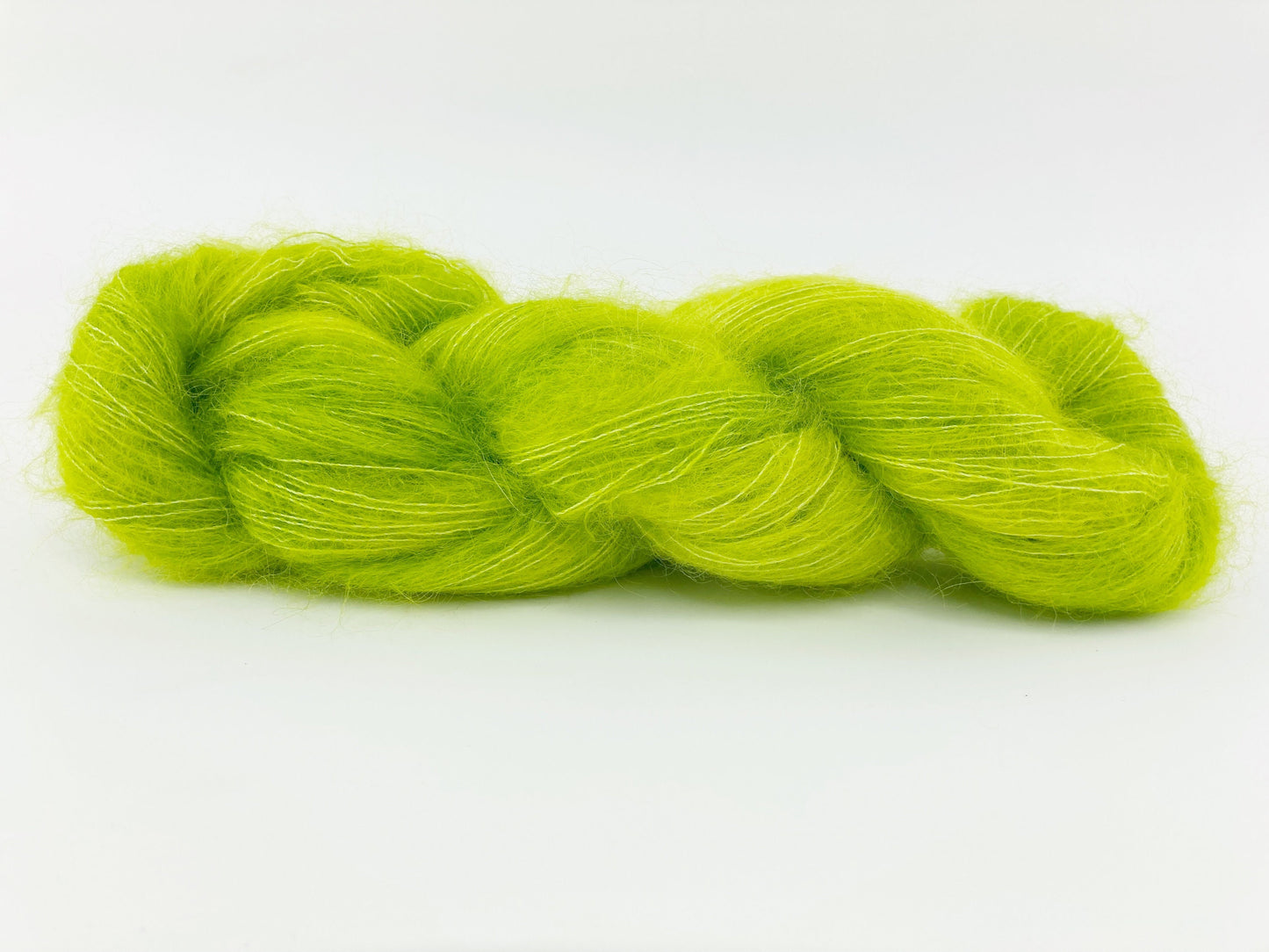 Hand Dyed SW extra fine Merino . DHG Piuma color "Chartreuse" .  Fluffy "Chartreuse" and "Bloom"