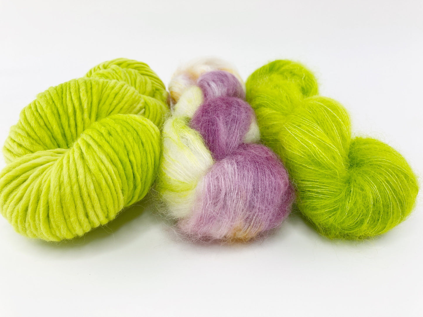 Hand Dyed SW extra fine Merino . DHG Piuma color "Chartreuse" .  Fluffy "Chartreuse" and "Bloom"