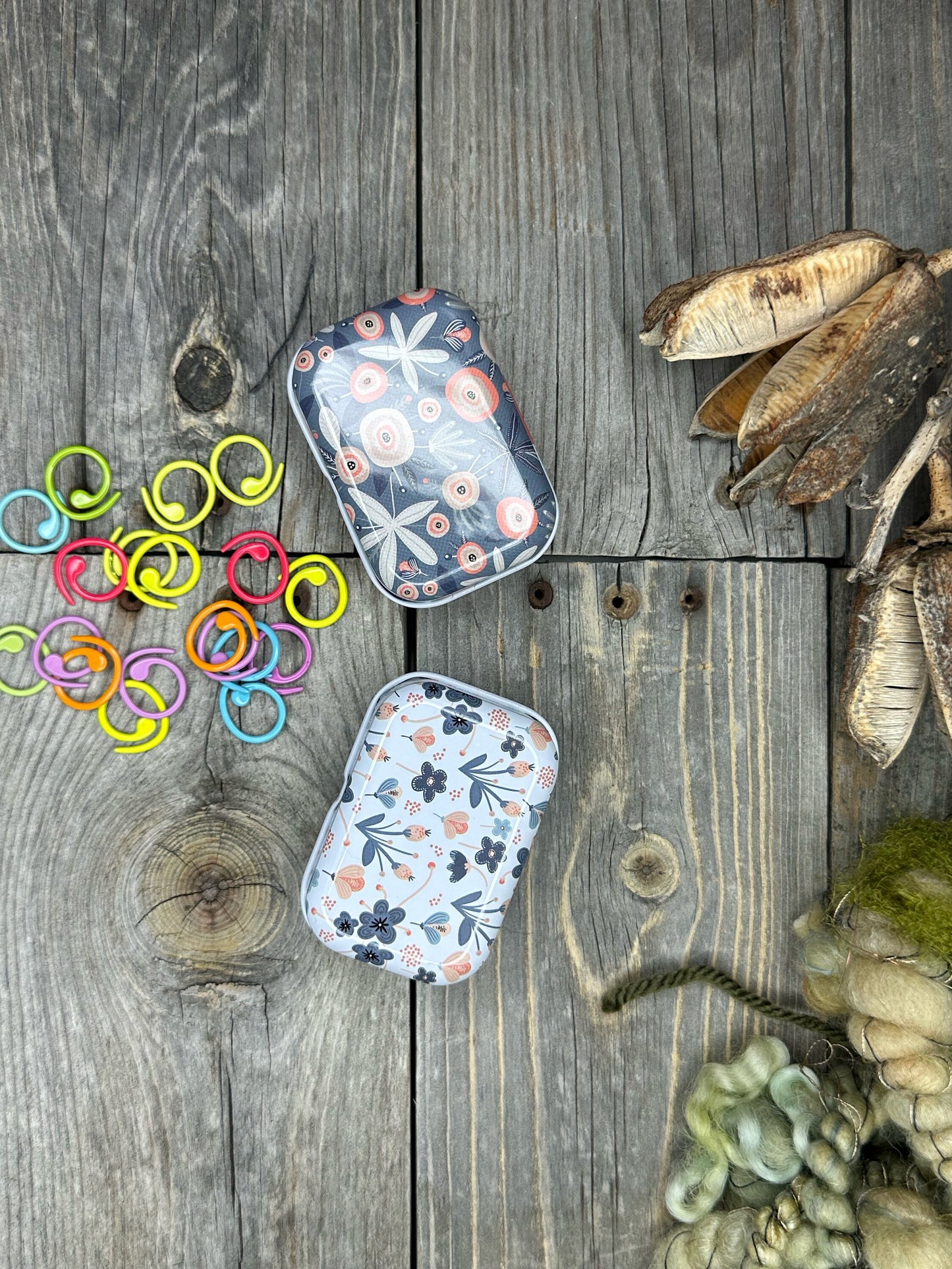 Knitting and crochet stitch markers . 30 assorted stitch markers in a collectible tin box