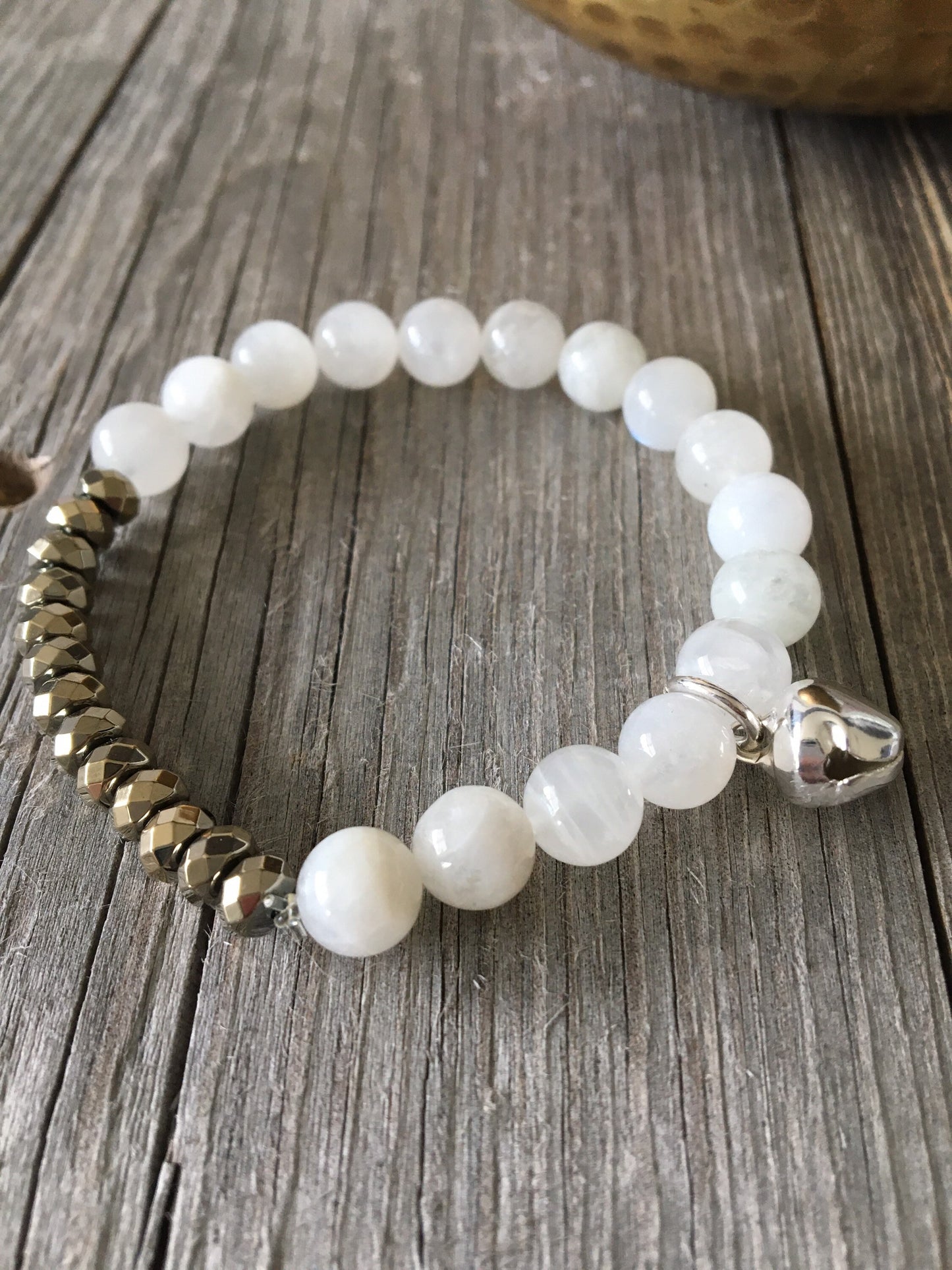 Moonstone Natural Stone bracelet with pyrite beads and a silver bell